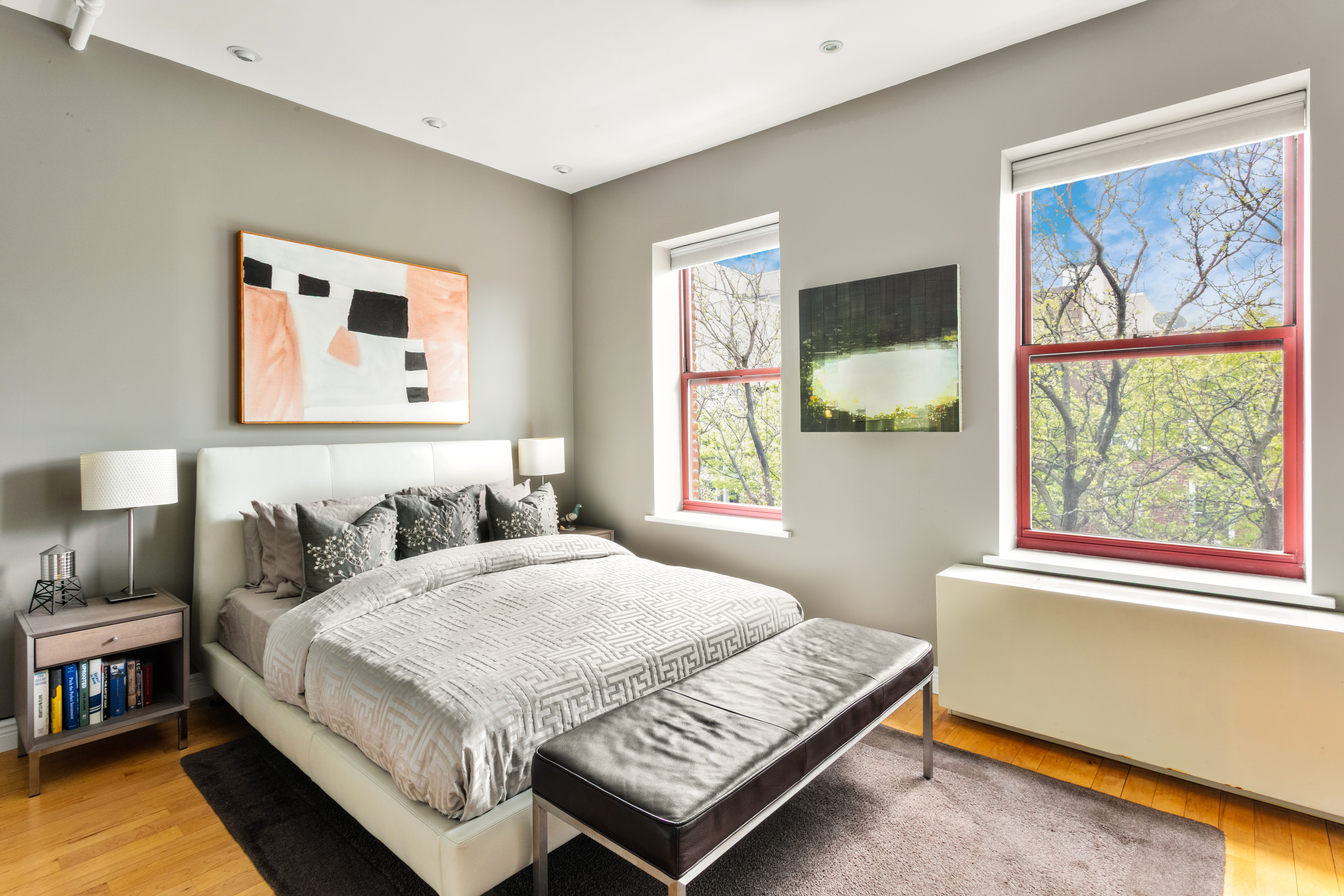 60 Tiffany Place, Unit 3C Brooklyn, NY 11231 - Photo 5 of 10 a bedroom with a bed and a window with the outer view