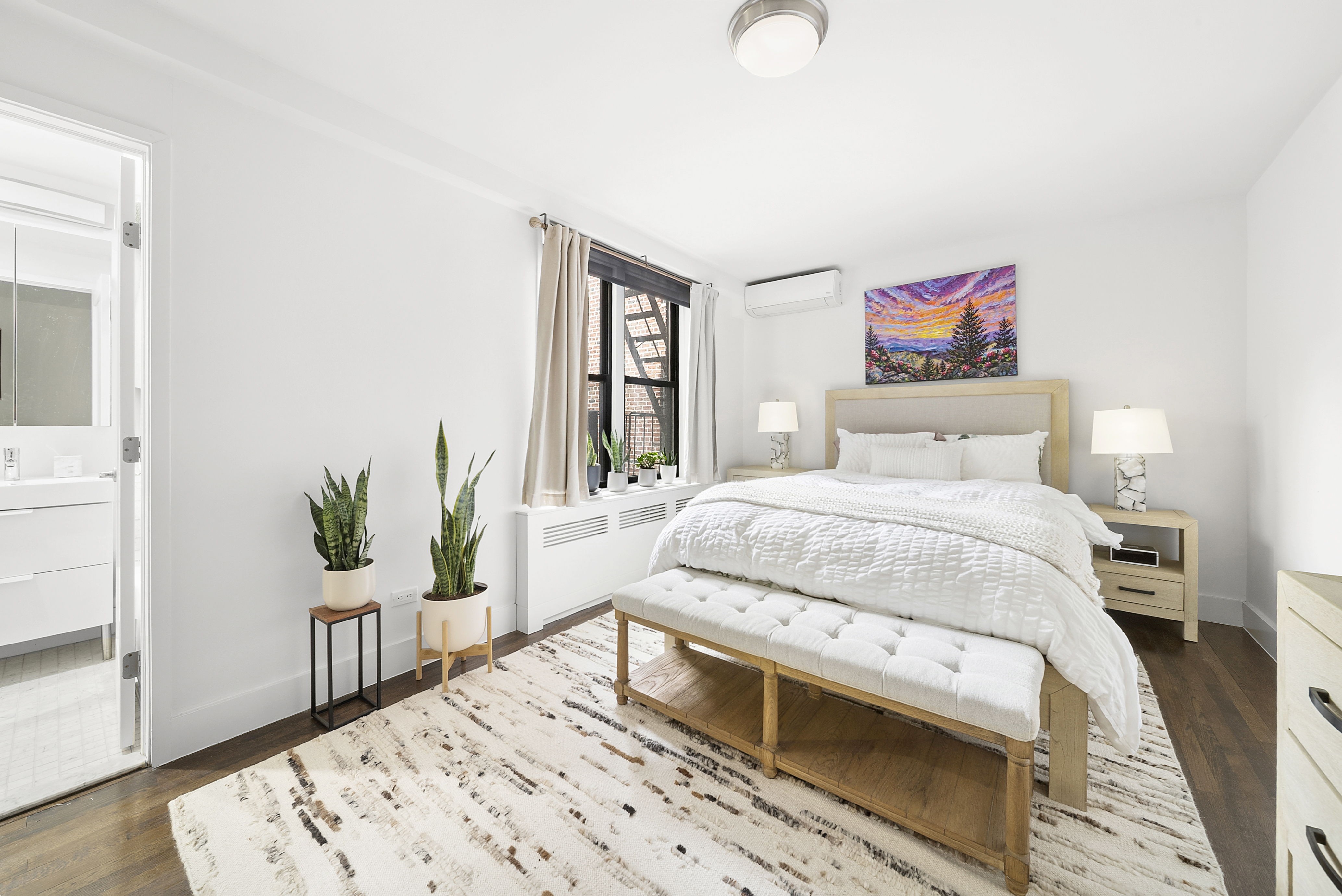 9511 Shore Road, Unit 505 Brooklyn, NY 11209 - Photo 3 of 18 a bedroom with a bed and a window