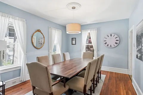 a kitchen with cabinets stainless steel appliances a sink and a microwave