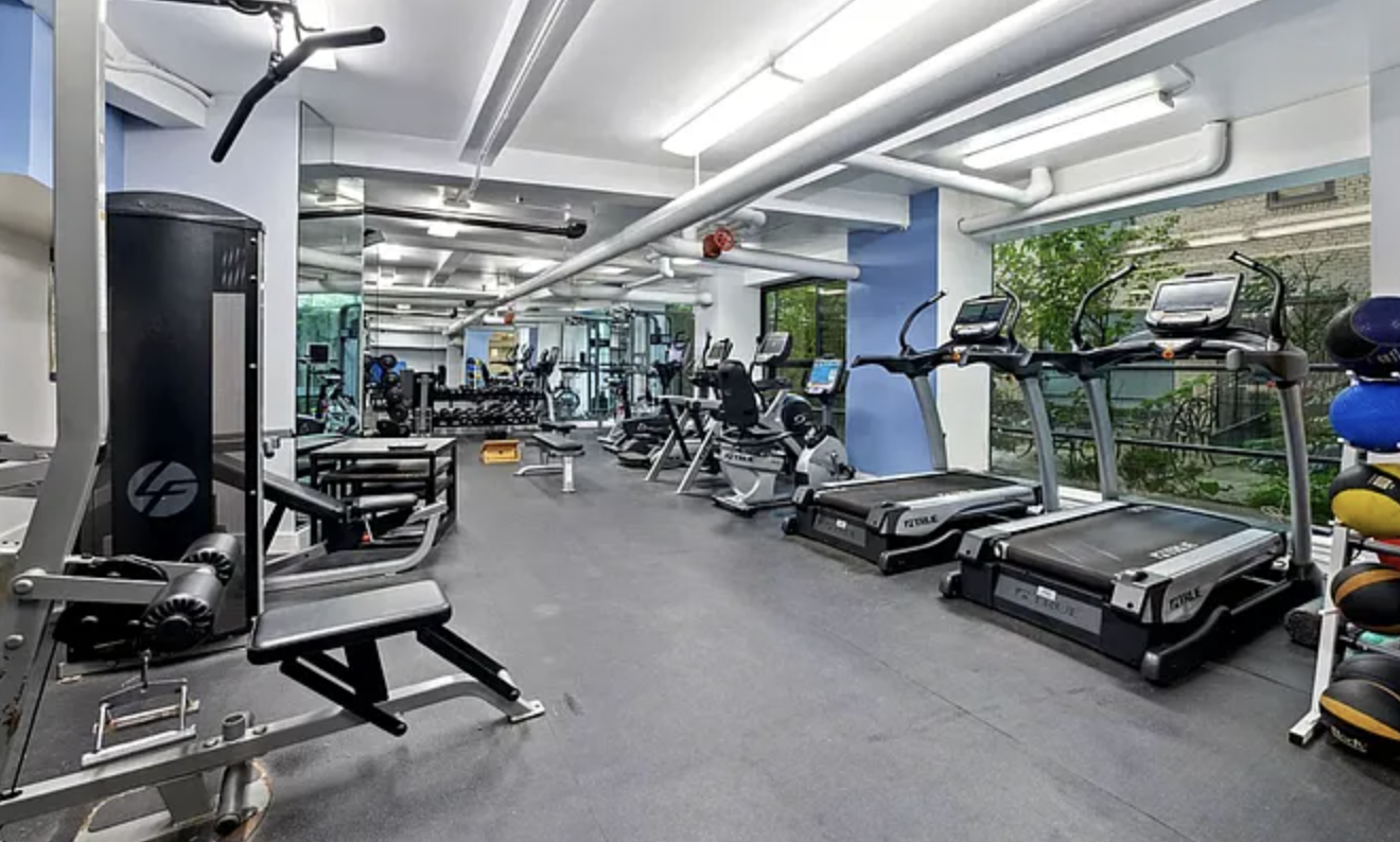 230 Riverside Drive, Unit 8C Manhattan, NY 10025 - Photo 7 of 10 a view of a room with gym equipment