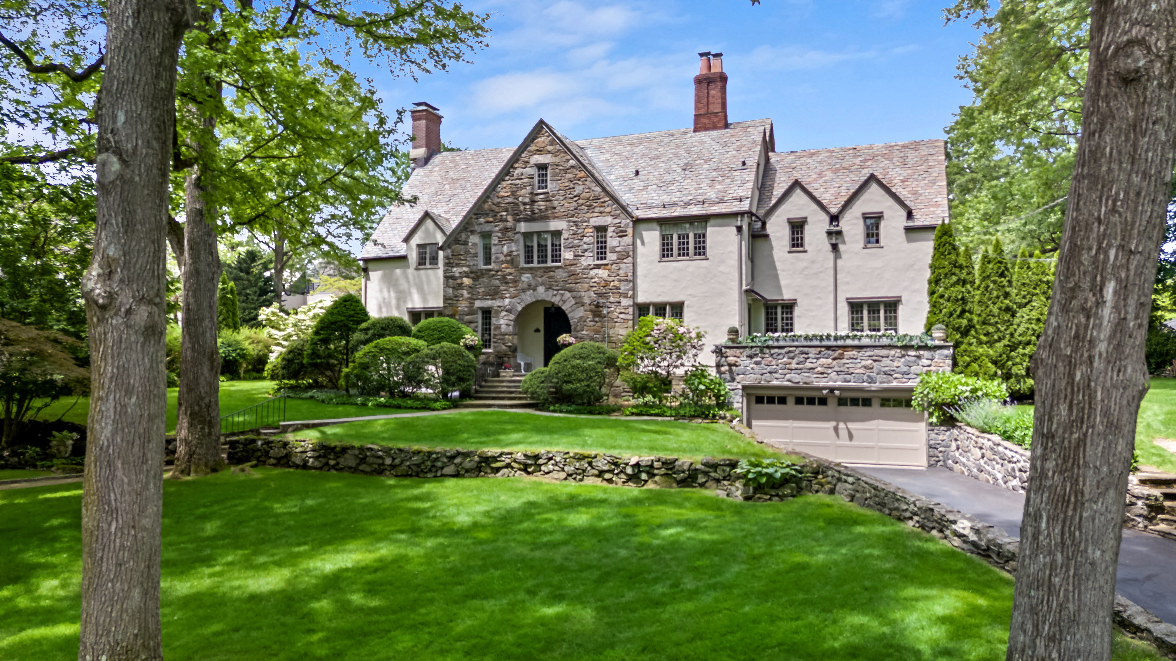 19 Avon Road Larchmont, NY 10538 - Photo 30 of 35 a front view of a house with a yard