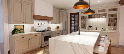 a kitchen with stainless steel appliances granite countertop a white cabinets and a stove
