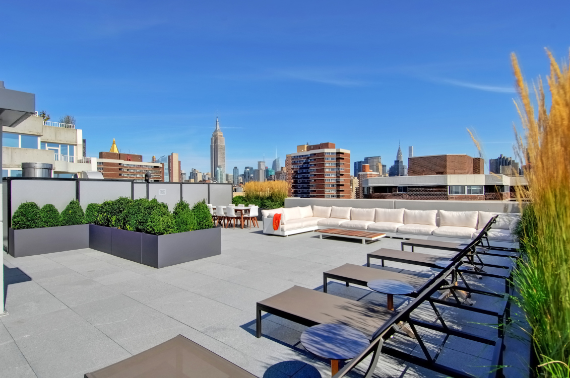 385 1st Avenue, Unit 6B Manhattan, NY 10010 - Photo 10 of 15 a view of a chairs and table in the terrace