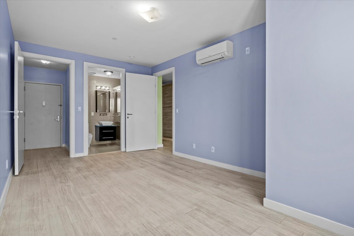 1972 Ocean Avenue, Unit 4A Brooklyn, NY 11230 - Photo 13 of 18 a view of empty room with wooden floor