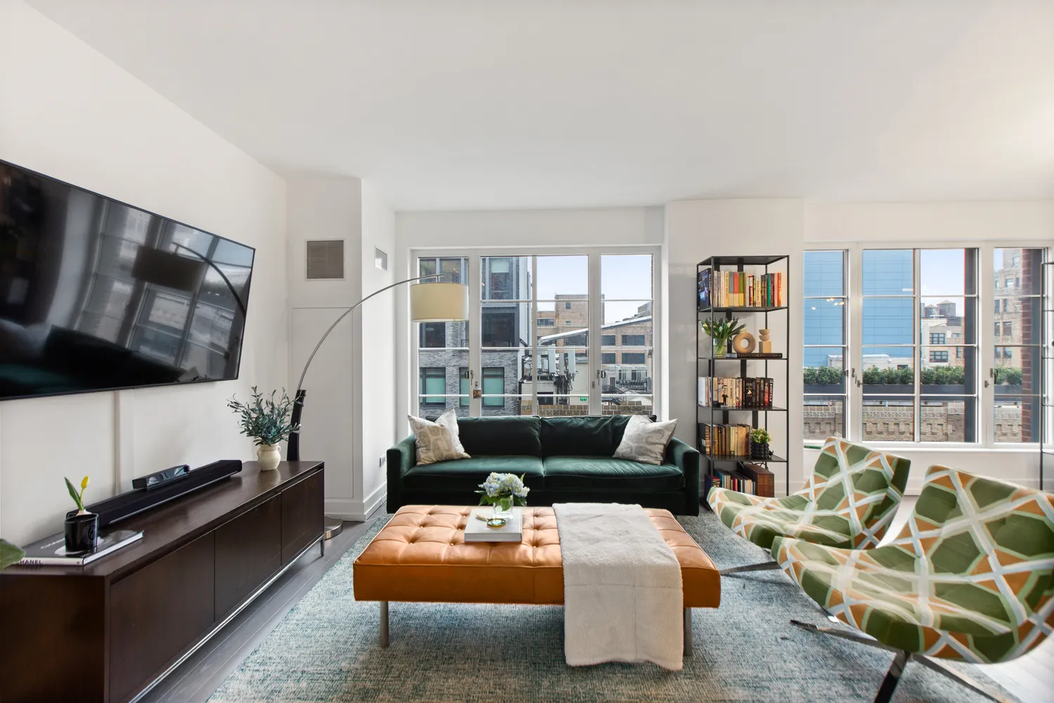 a living room with furniture fireplace and a flat screen tv