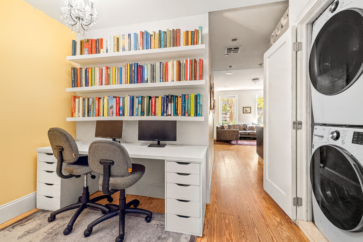 667 Carroll Street, Unit 2 Brooklyn, NY 11215 - Photo 4 of 7 a view of a workspace with furniture and a bookshelf