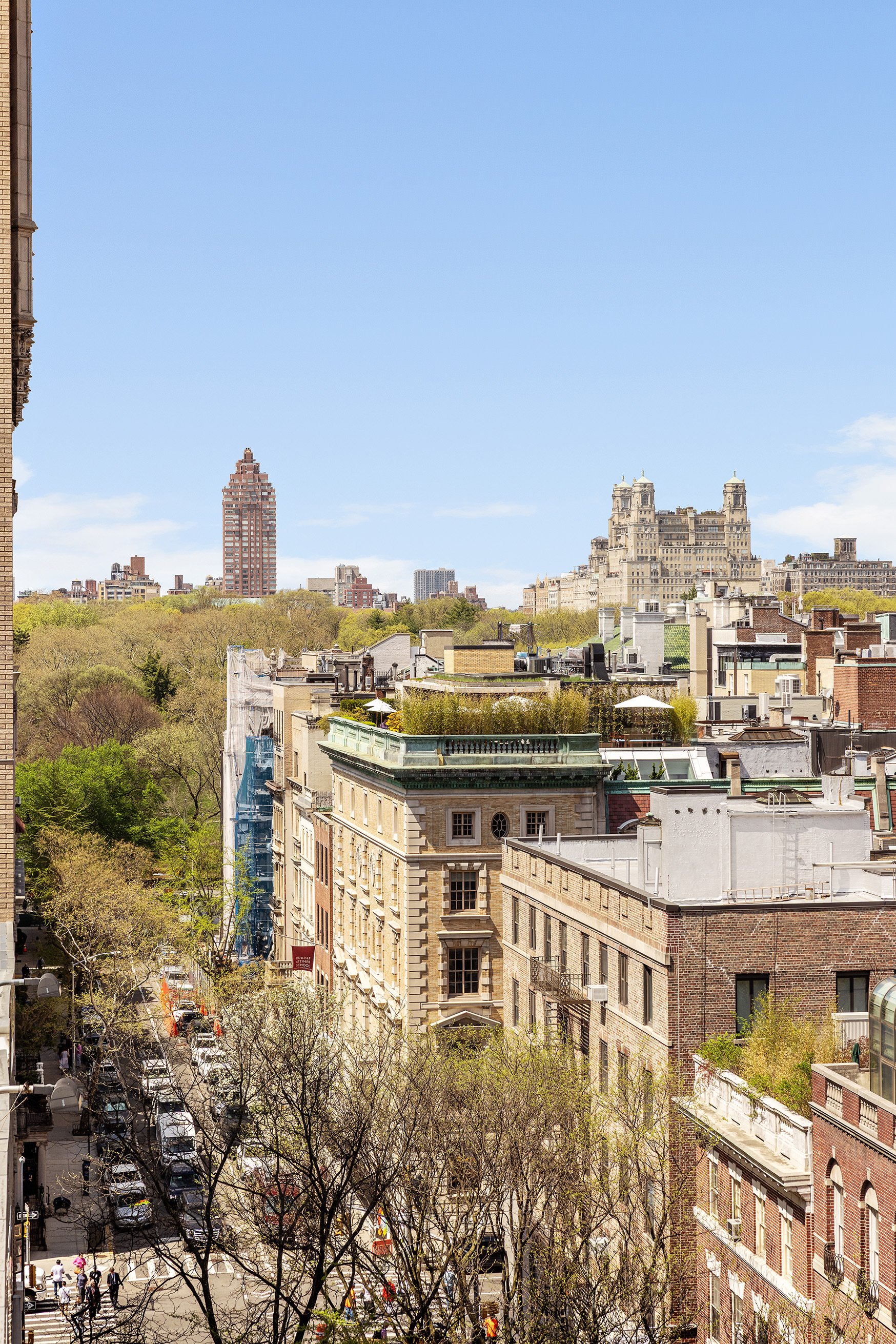 876 Park Avenue, Unit 9N Manhattan, NY 10075 - Photo 4 of 18 a view of a lake with building in front of it