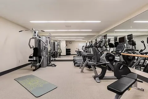a view of a room with gym equipment