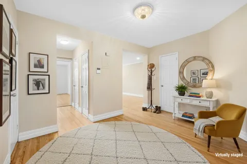 a room with gym equipment and a large mirror