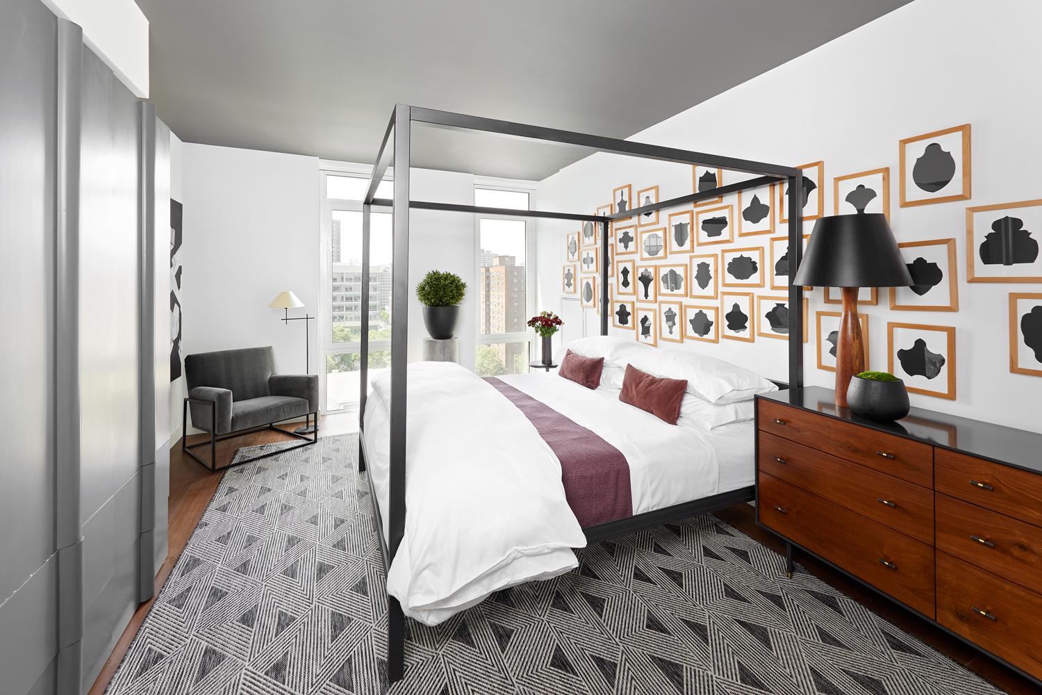 120 Nassau Street, Unit 23A Brooklyn, NY 11201 - Photo 3 of 12 a bedroom with a bed couch and a window