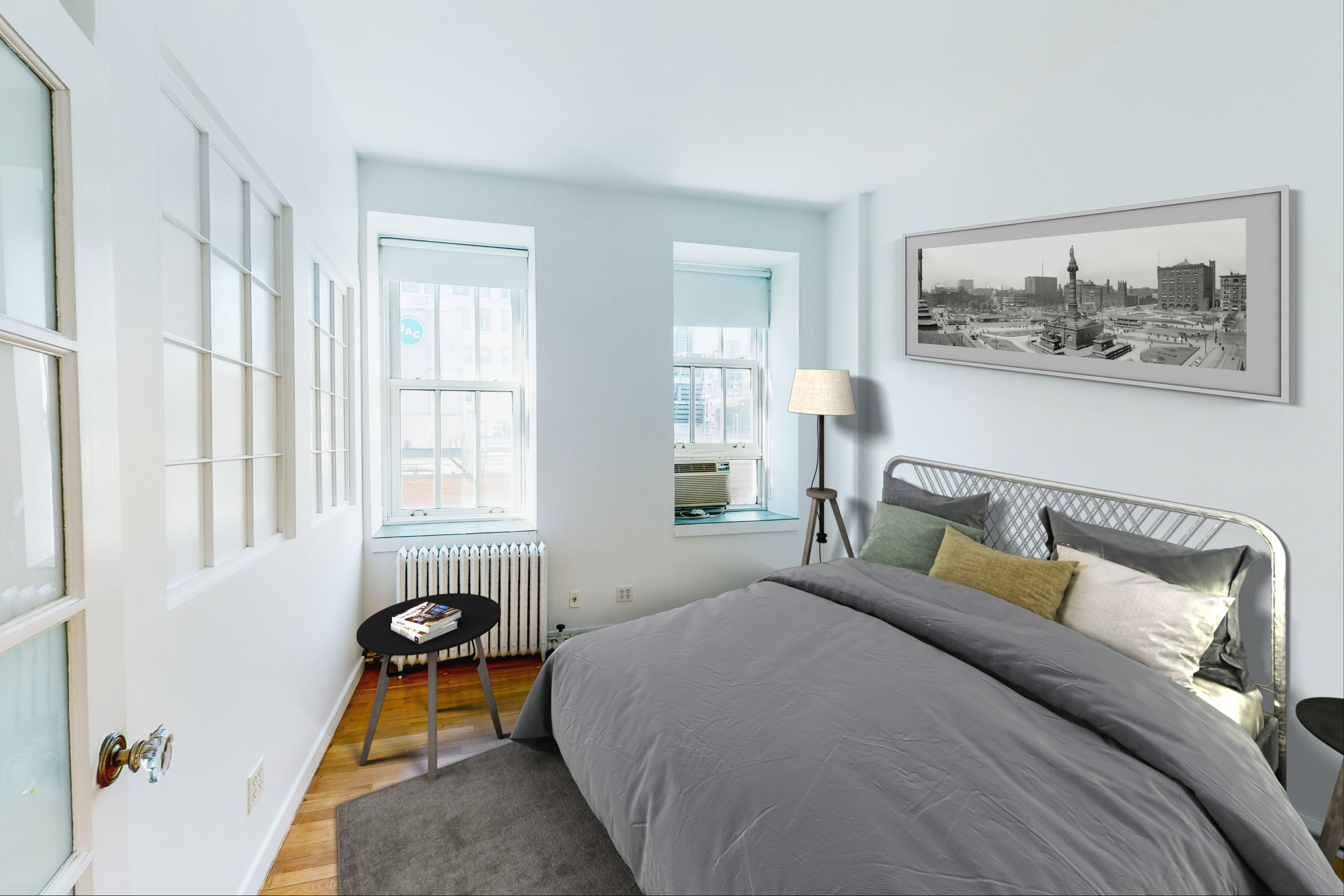 395 Broadway, Unit 7E Manhattan, NY 10013 - Photo 5 of 7 a bedroom with a bed and a couch