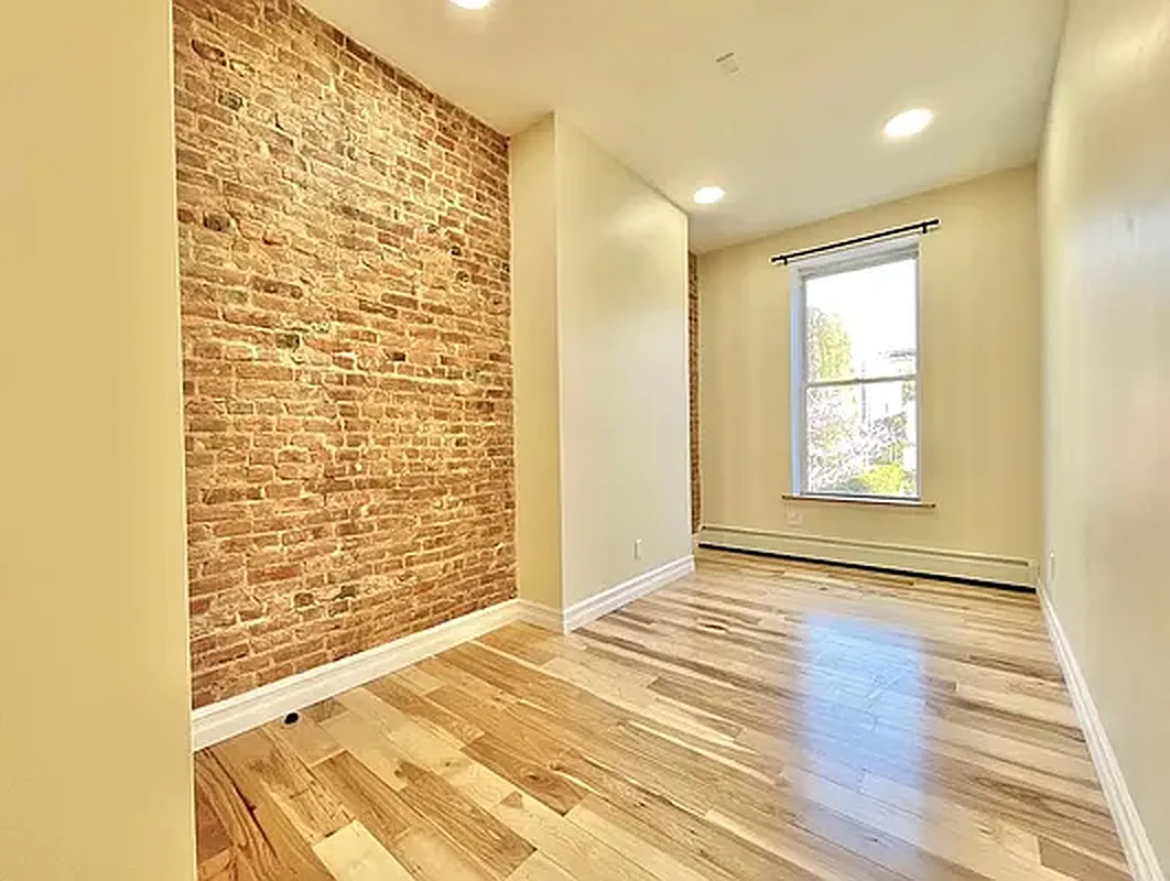 1120 Greene Avenue, Unit 1 Brooklyn, NY 11221 - Photo 8 of 13 a view of an empty room and window