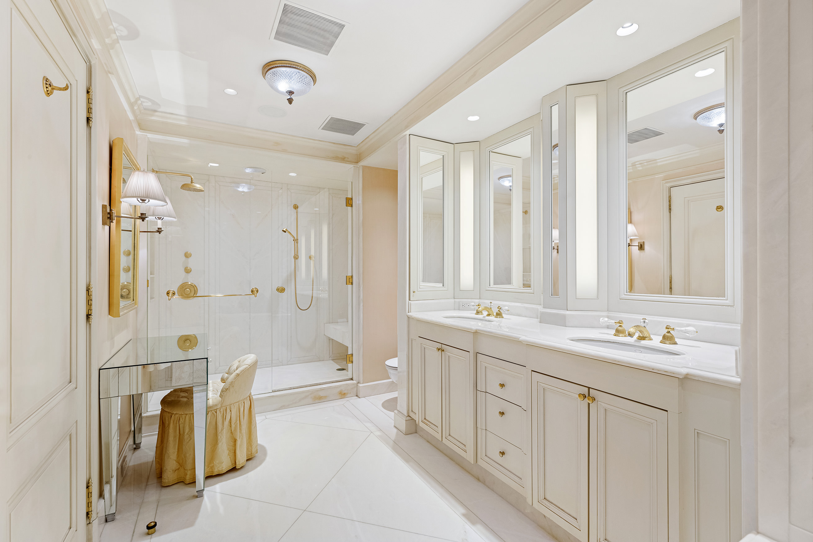 15 West 81st Street, Unit 2D Manhattan, NY 10024 - Photo 11 of 31 a spacious bathroom with a double vanity sink mirror and a