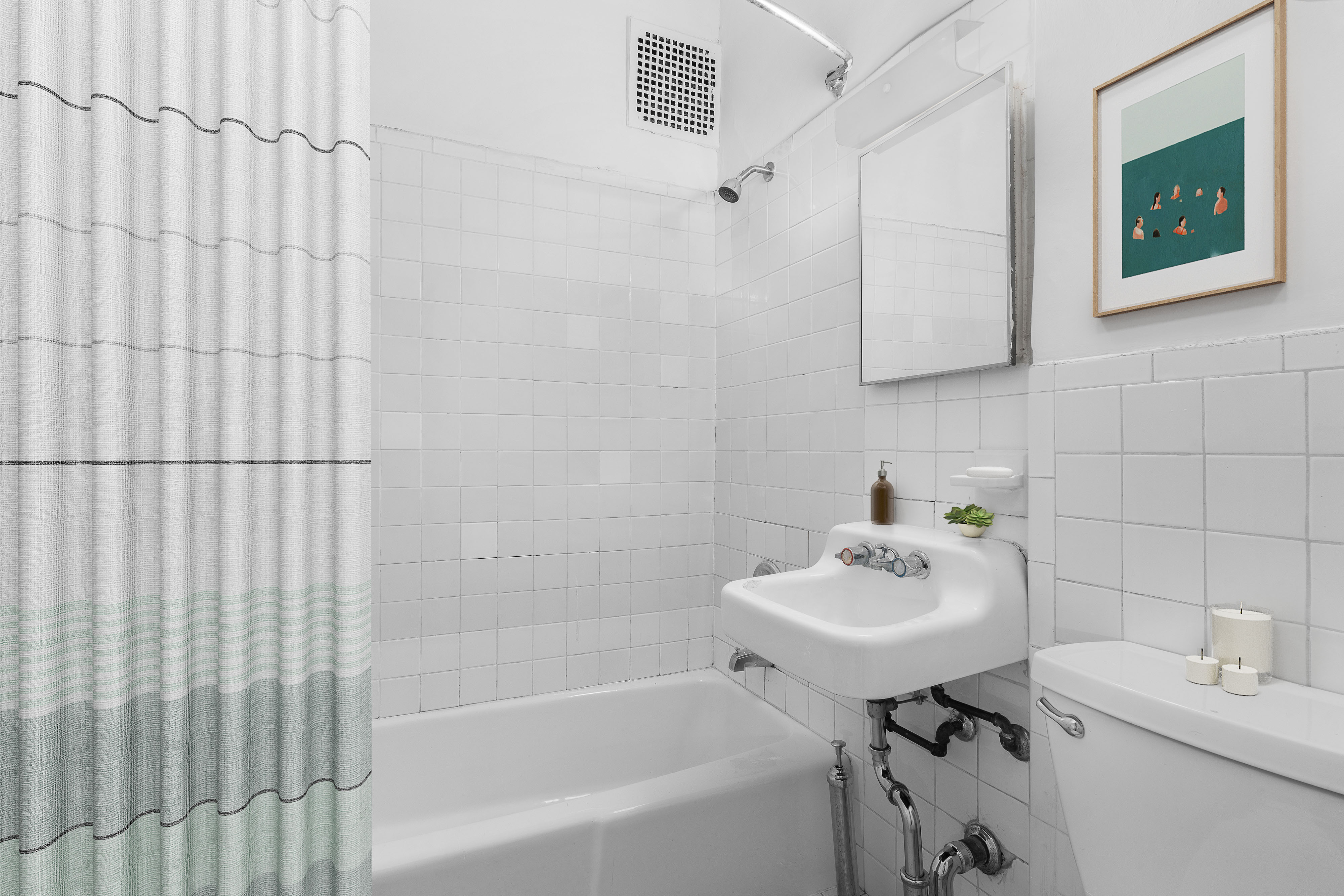 168 Dean Street, Unit 2 Brooklyn, NY 11217 - Photo 6 of 7 a bathroom with a sink a bathtub and a window
