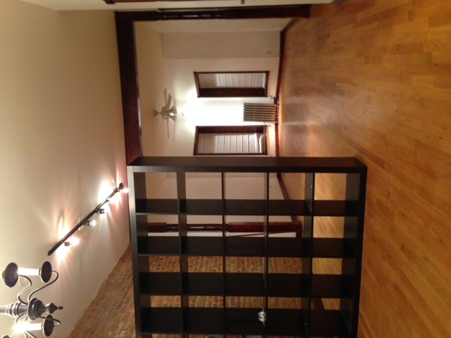 250 57th Street Brooklyn, NY 11220 - Photo 7 of 15 a view of empty room with wooden floor