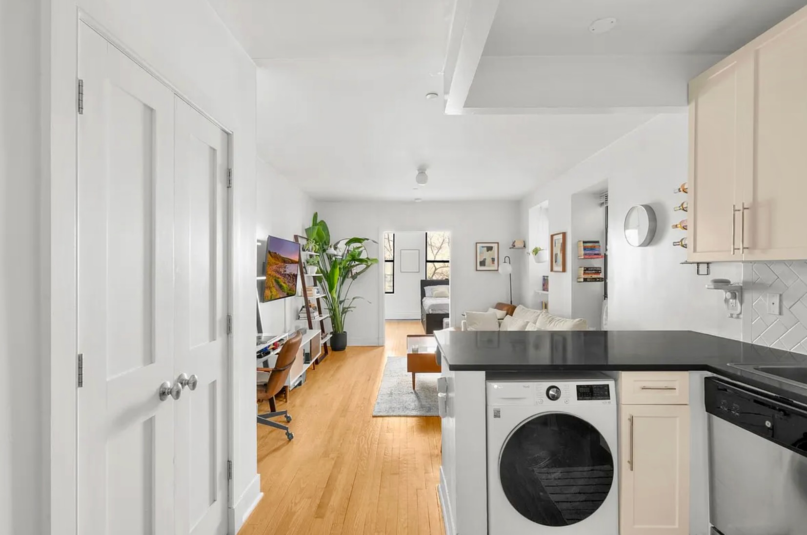 305 West 150th Street, Unit 203 Manhattan, NY 10039 - Photo 3 of 6 a view of a kitchen and utility room