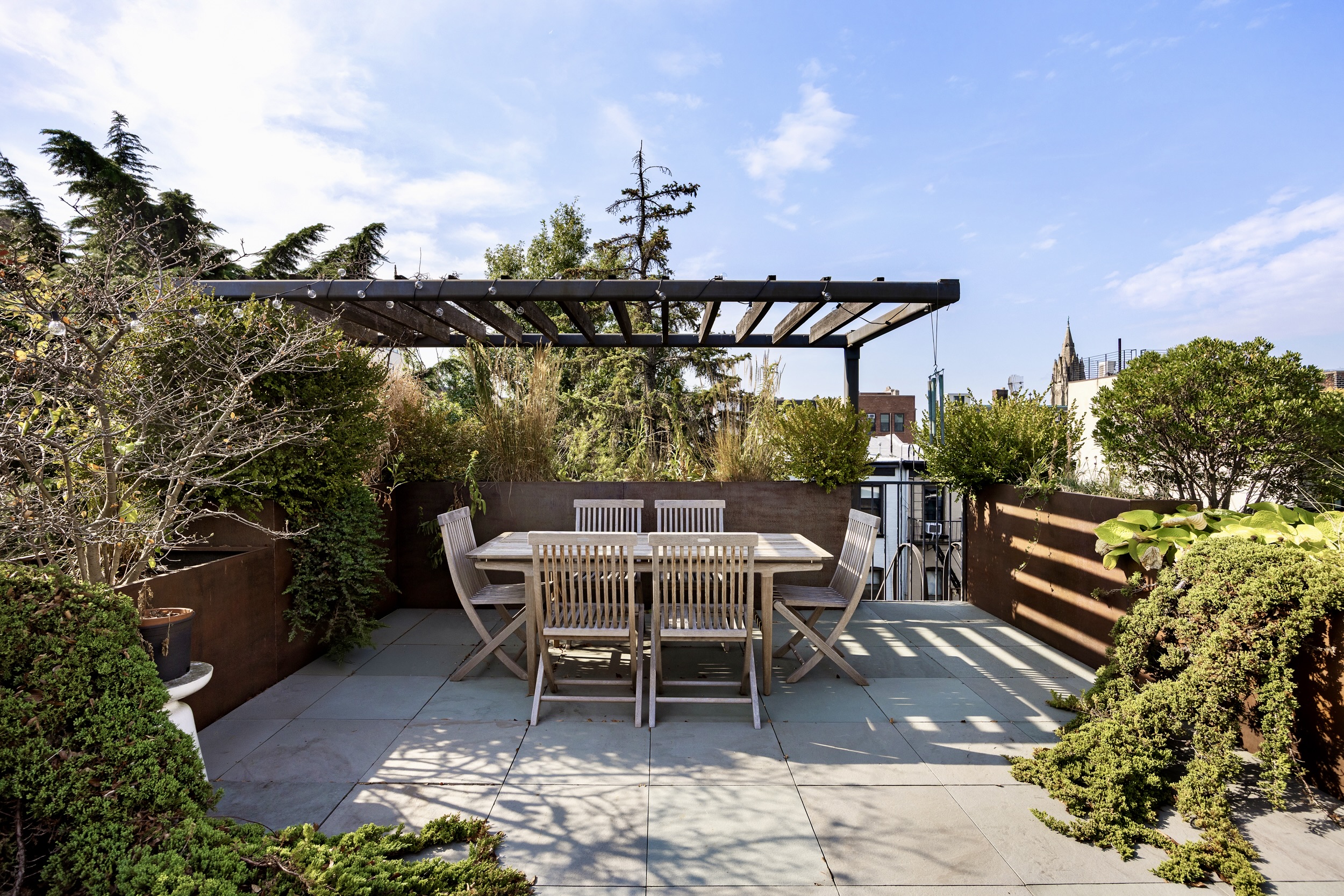 134 Berkeley Place, Unit 3 Brooklyn, NY 11217 - Photo 26 of 30 a view of a backyard with sitting area