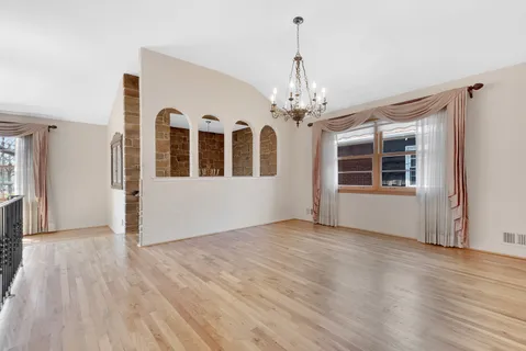 a view of a room with windows