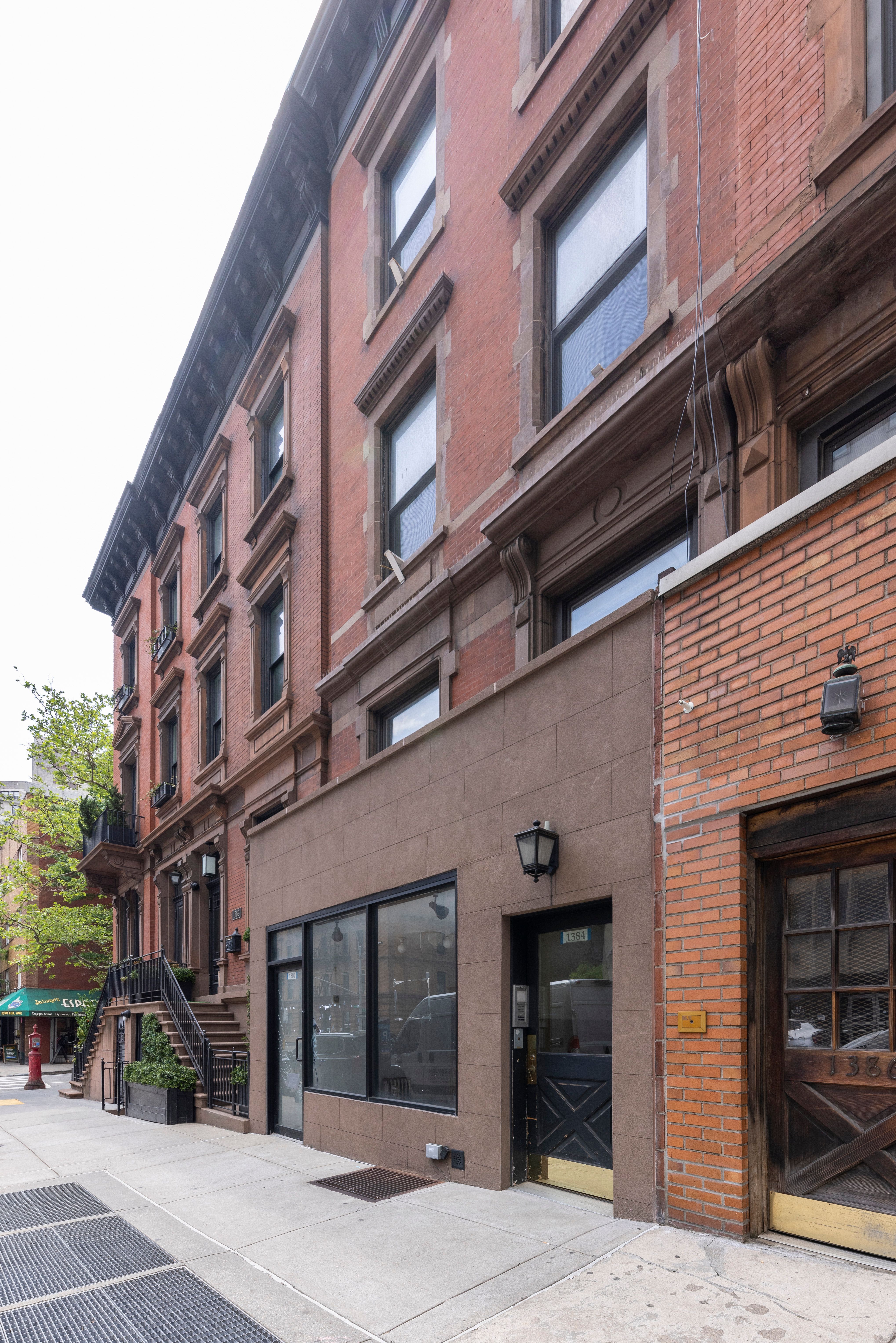 1384 Lexington Avenue, Unit 2 Manhattan, NY 10128 - Photo 10 of 11 a view of a building with a street