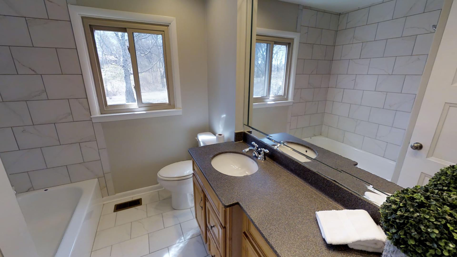 4425 Prescott Road Nashville, TN 37204 - Photo 17 of 26 a bathroom with a sink toilet and tub