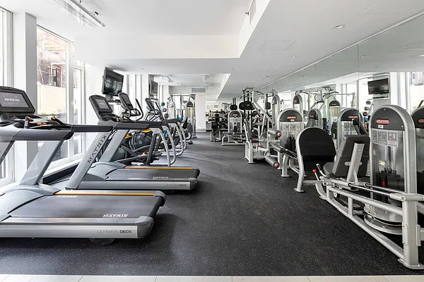133 West 22nd Street, Unit 6L Manhattan, NY 10011 - Photo 9 of 11 a view of a room with gym equipment