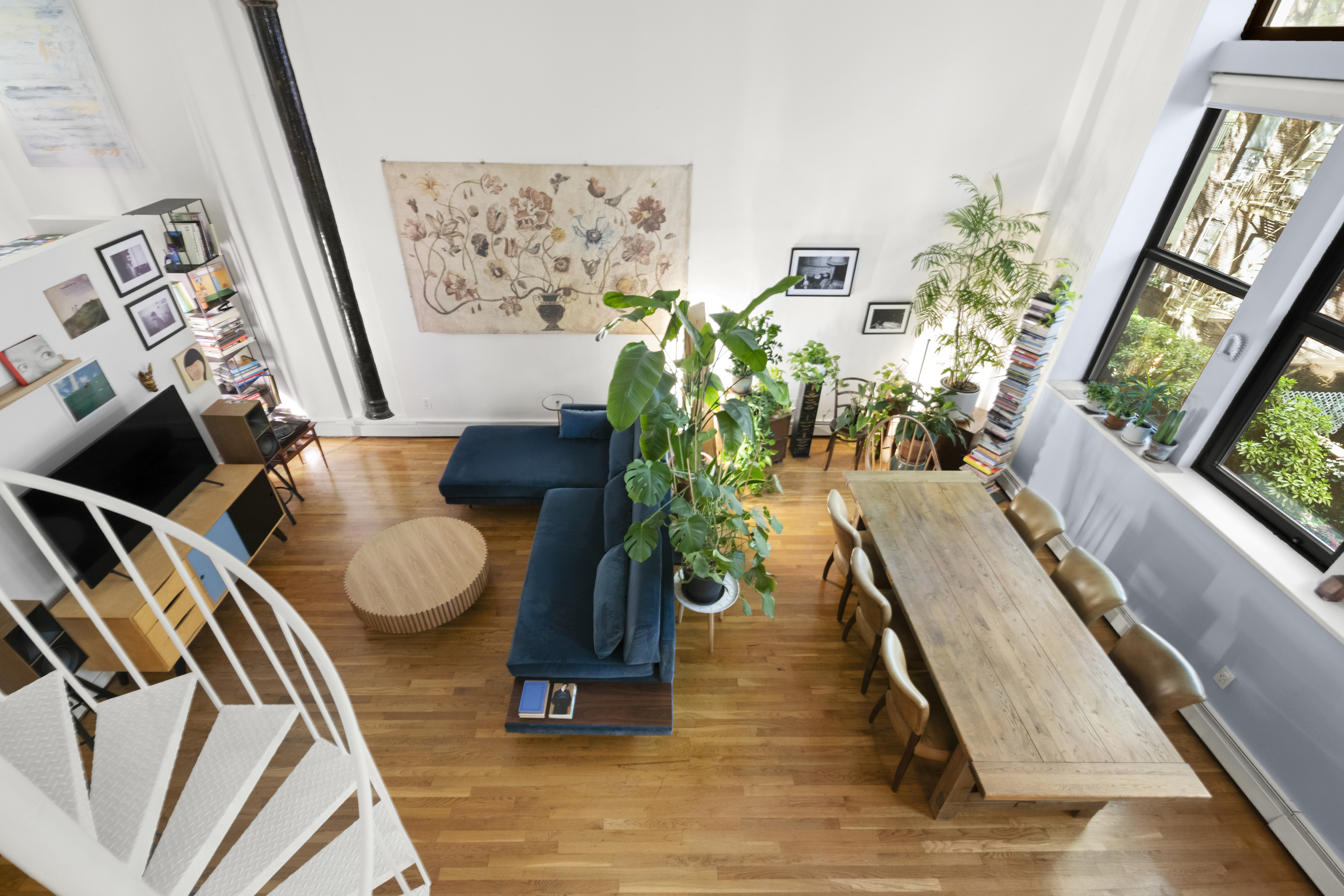 309 East 108th Street, Unit 2/D Manhattan, NY 10029 - Photo 8 of 12 a view of living room filled with furniture and wooden floor