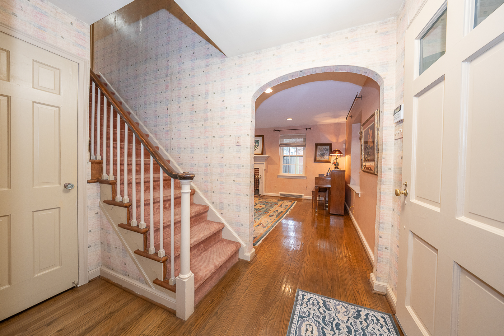 519 Mercer Road Merion Station, PA 19066 - Photo 11 of 58 a view of a livingroom with wooden floor and stairs