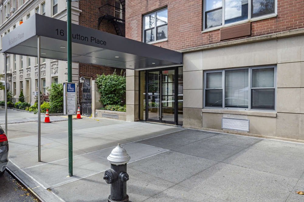 16 Sutton Place, Unit 11A Manhattan, NY 10022 - Photo 14 of 19 a view of a building with door