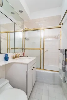 a bathroom with a sink and mirror