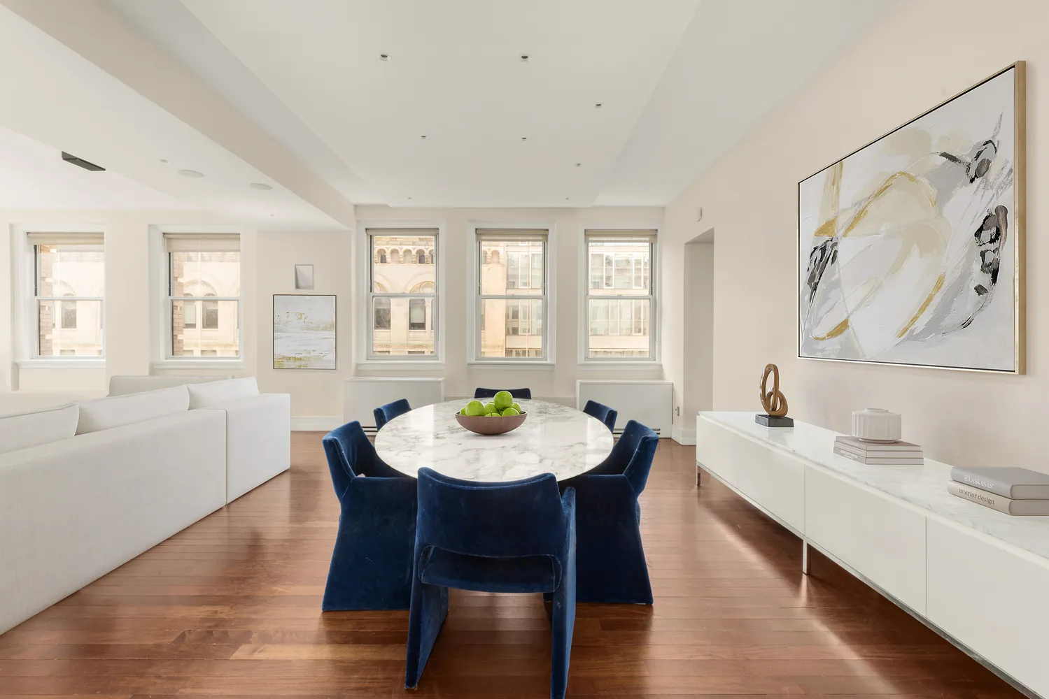 a view of a dining room with furniture and window