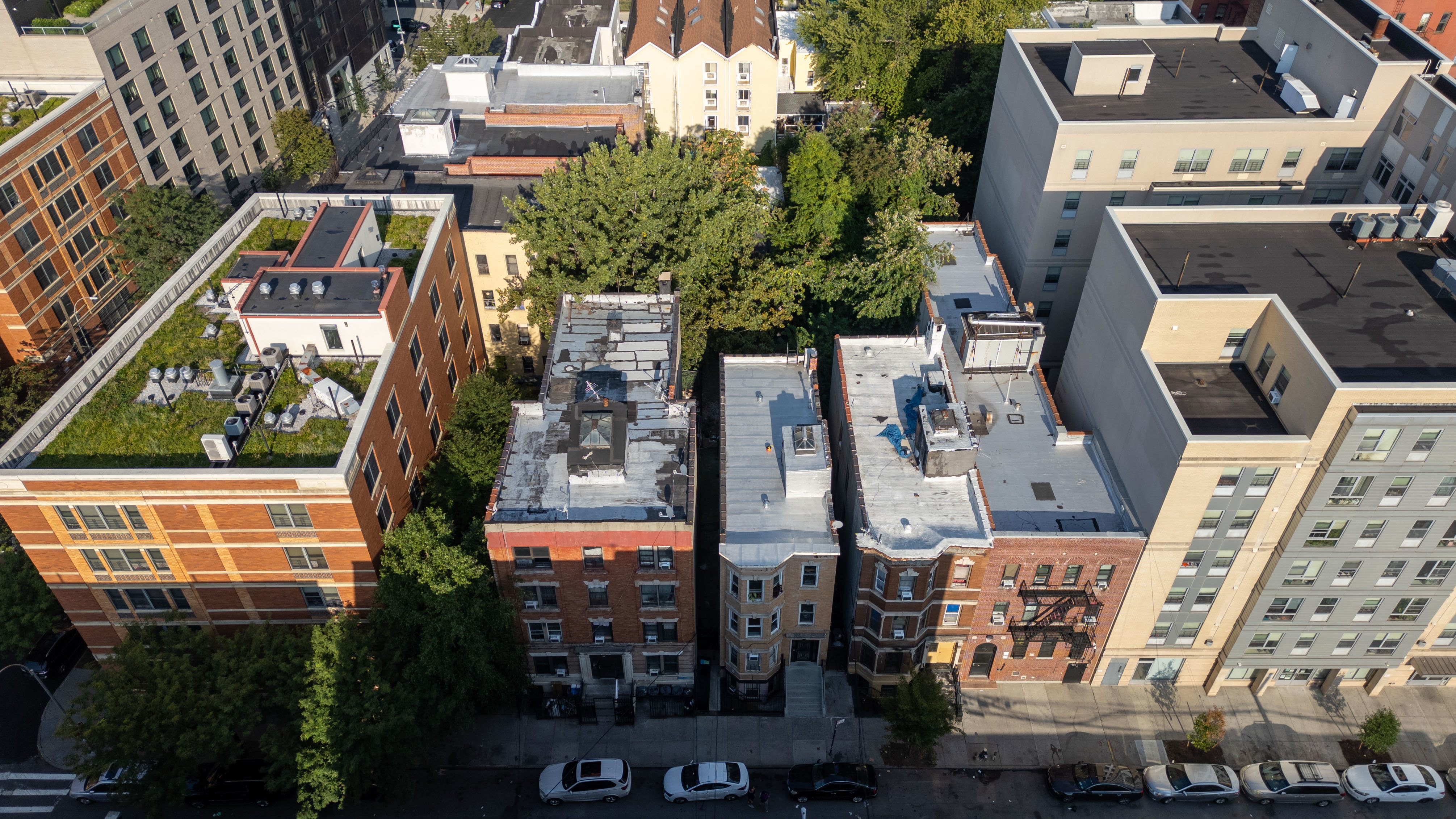 2023 Hughes Avenue Bronx, NY 10457 - Photo 29 of 63 an aerial view of houses with outdoor space