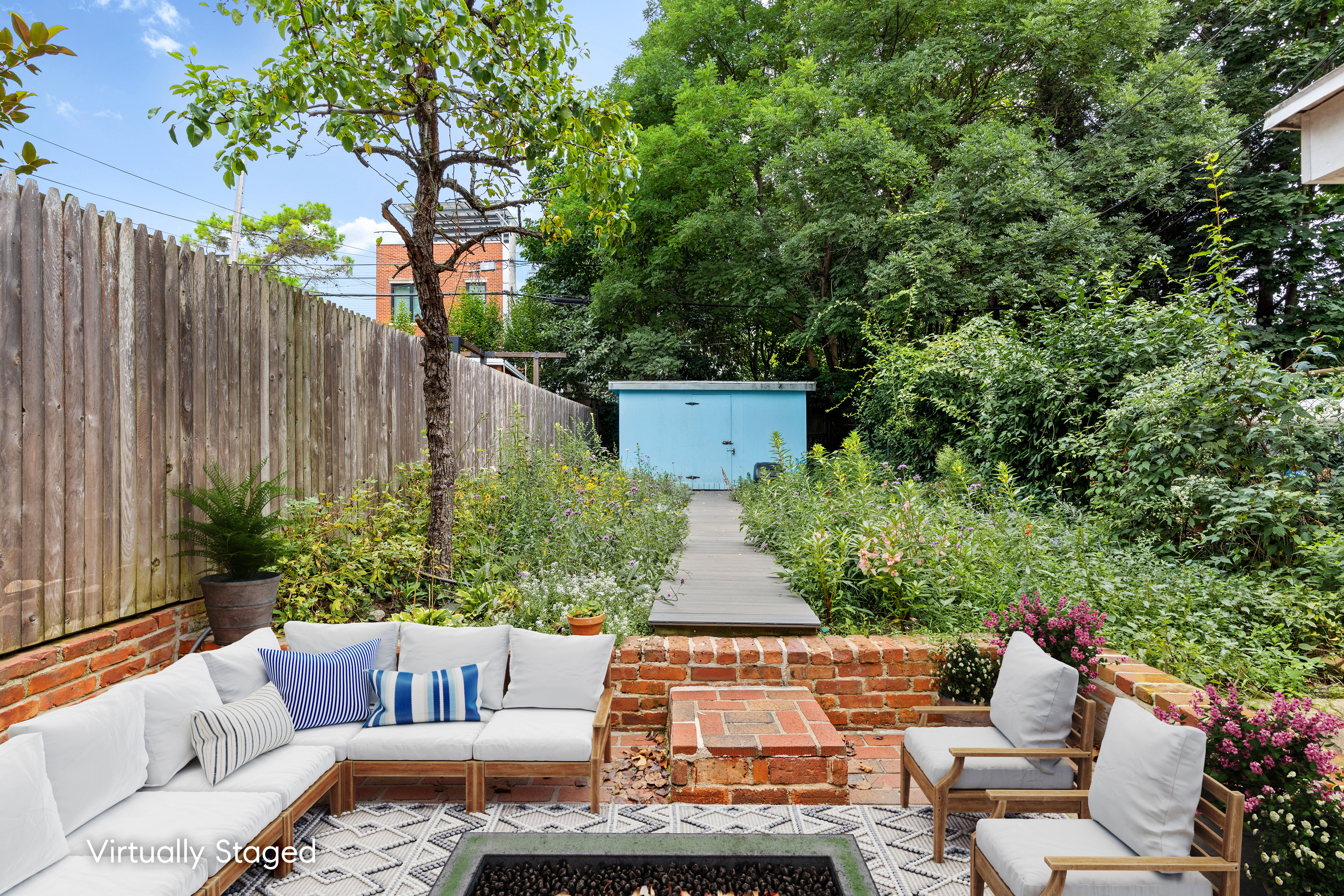 537 18th Street Brooklyn, NY 11215 - Photo 10 of 12 a view of a house with couches in a patio