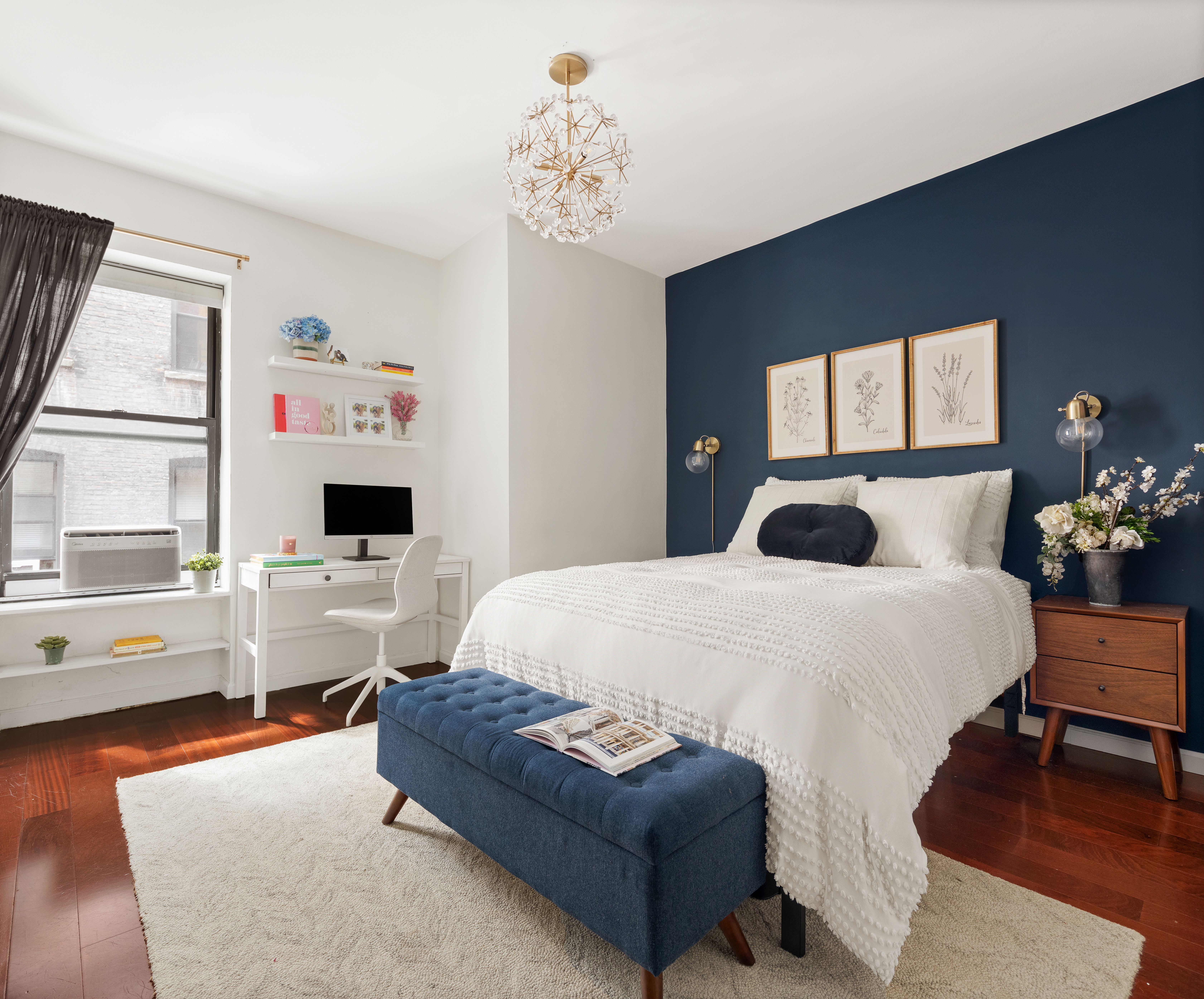 310 West 99th Street, Unit 308 Manhattan, NY 10025 - Photo 4 of 10 a bedroom with a bed and wooden floor