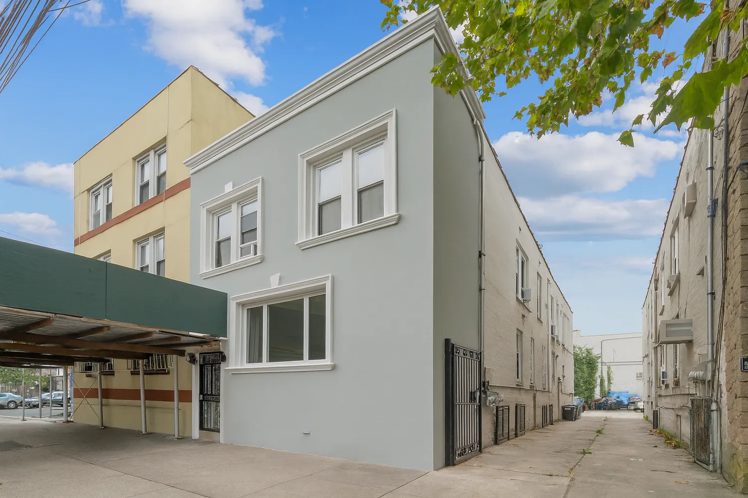a room with furniture pool table and windows