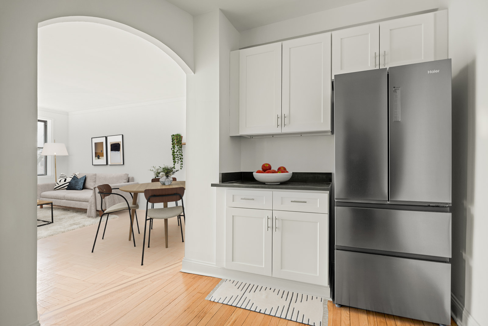 385 East 18th Street, Unit 4E Brooklyn, NY 11226 - Photo 2 of 7 a kitchen with a refrigerator and white cabinets