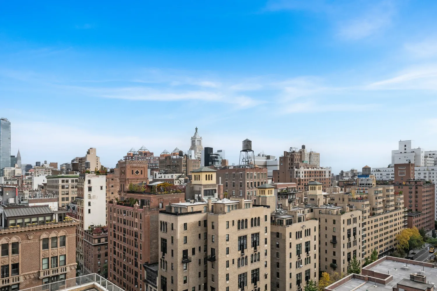 a view of a city with tall buildings