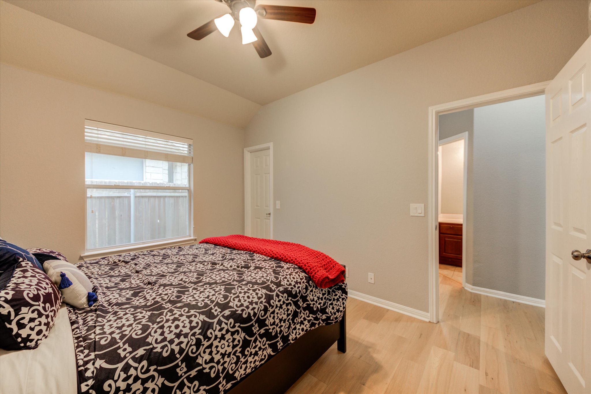 5412 Batak Lane Austin, TX 78749 - Photo 18 of 40 a bedroom with bed and window