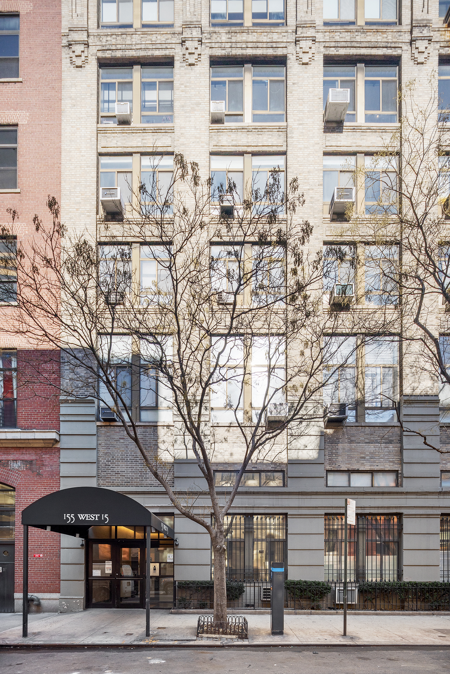 155 West 15th Street, Unit 1J Manhattan, NY 10011 - Photo 12 of 13 a front view of a building with streets