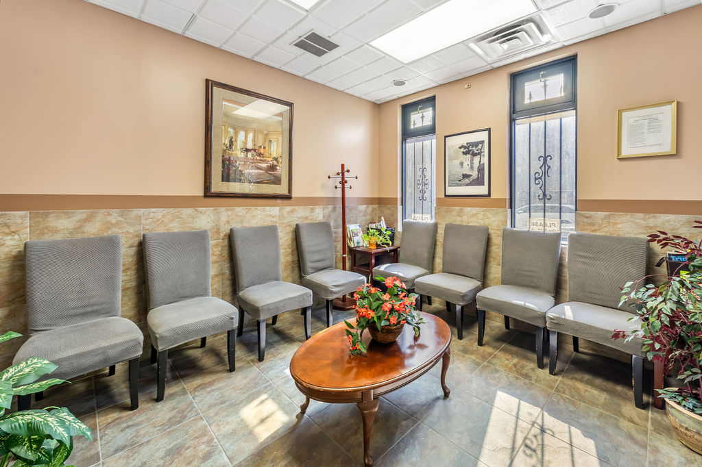 869 Bergen Avenue, Unit COMMERCIAL Jersey City, NJ 07306 - Photo 2 of 26 a living room with furniture and a wooden floor