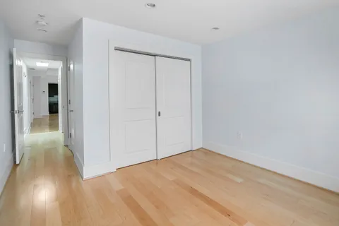 wooden floor in a hall with an entryway