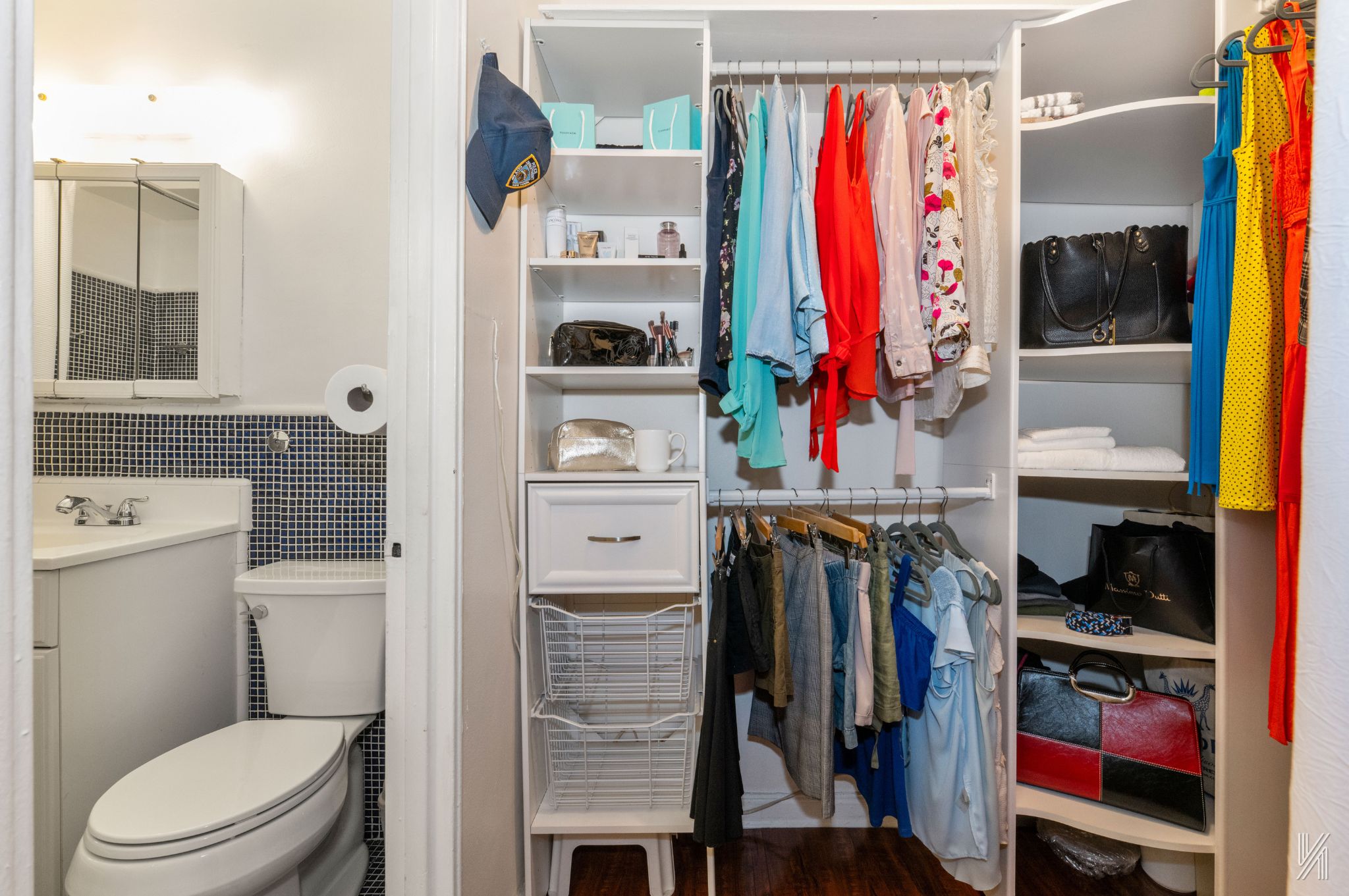 39-30 52nd Street, Unit 5E Queens, NY 11377 - Photo 10 of 15 a view of walk in closet with clothes and shoes