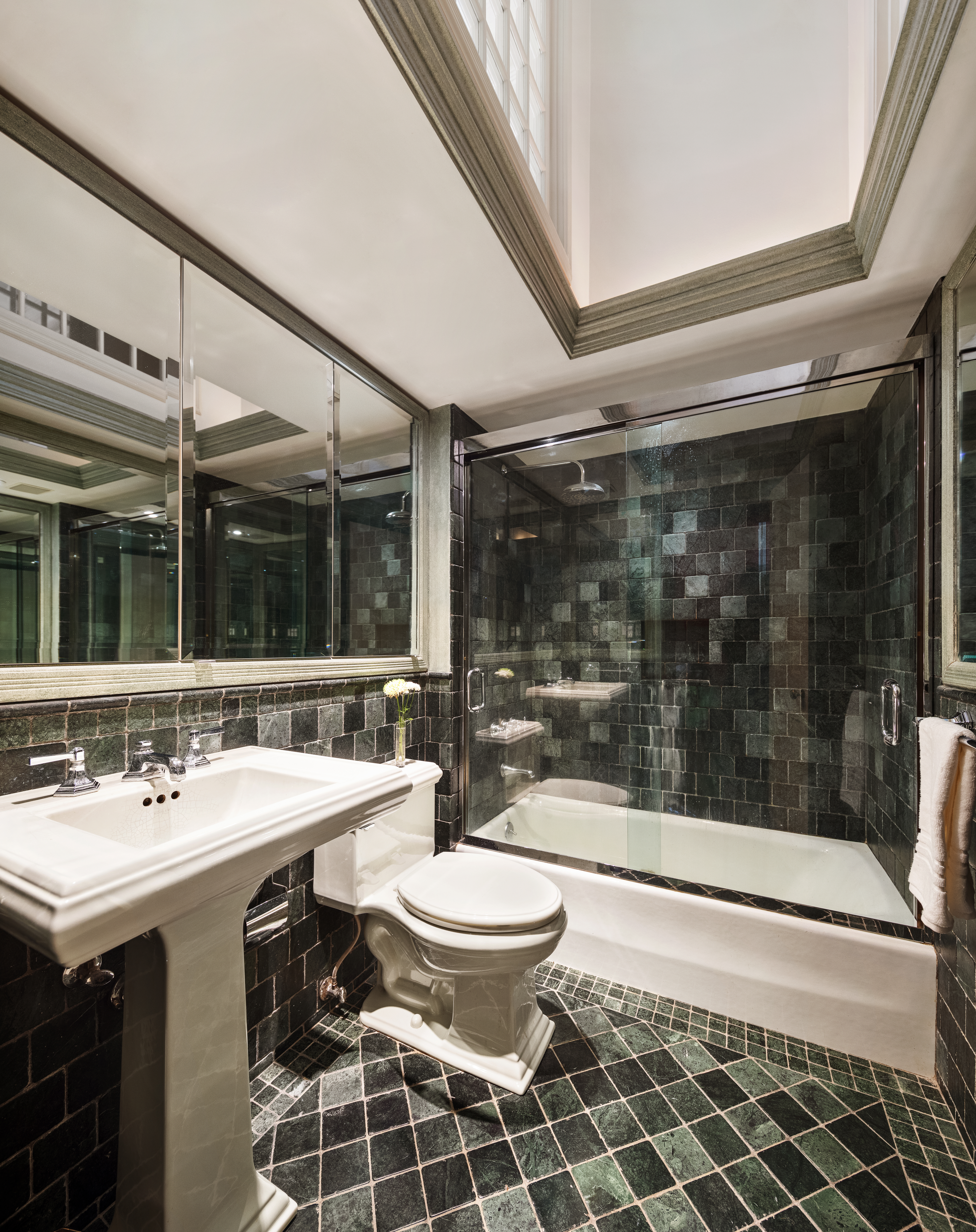 34 Gramercy Park East, Unit MAF Manhattan, NY 10010 - Photo 8 of 17 a bathroom with a sink mirror vanity and toilet