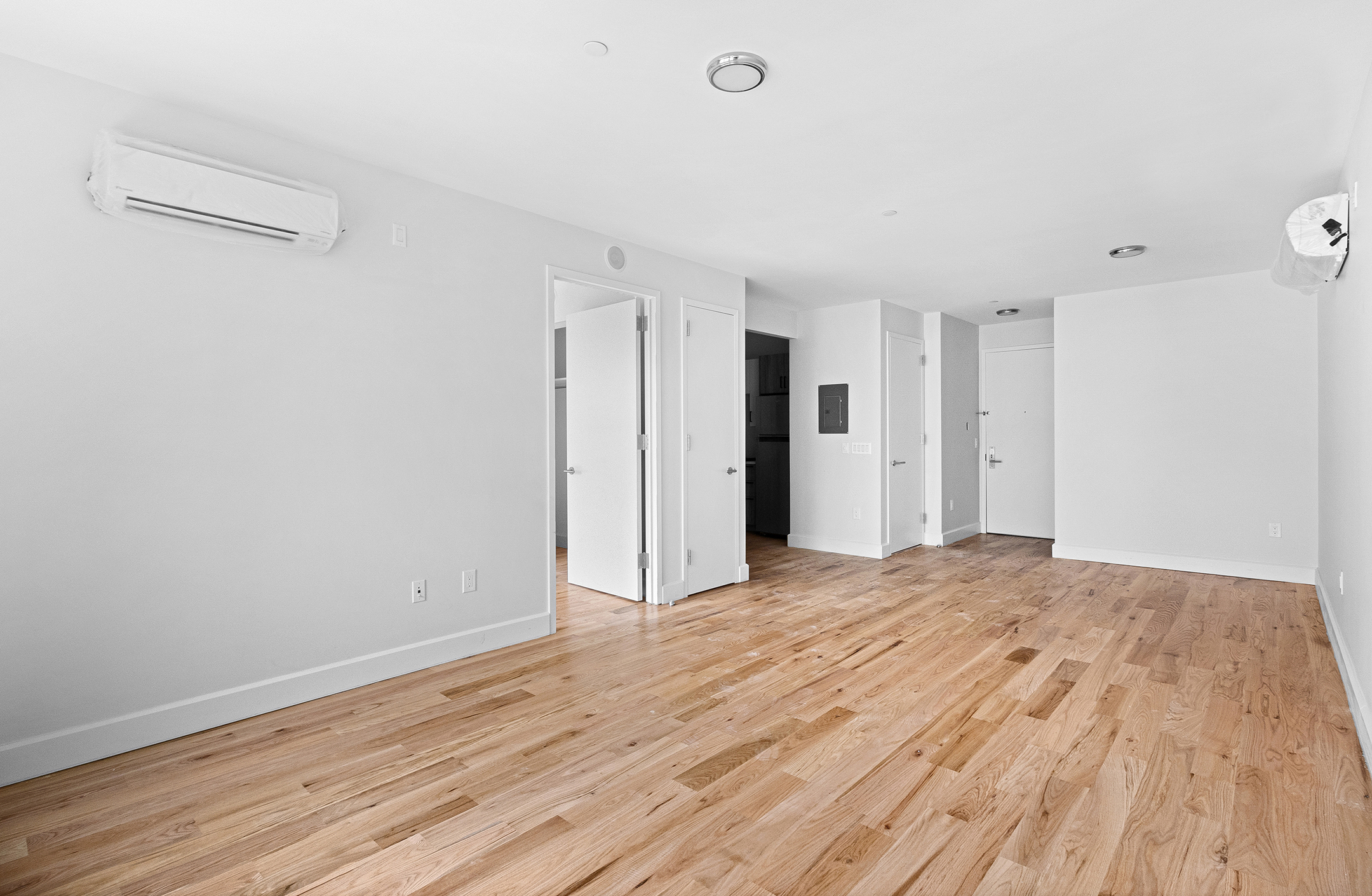 1098 Madison Street, Unit 4B Brooklyn, NY 11221 - Photo 4 of 11 a view of empty room with wooden floor