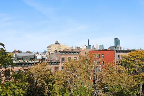 a view of a city with tall buildings