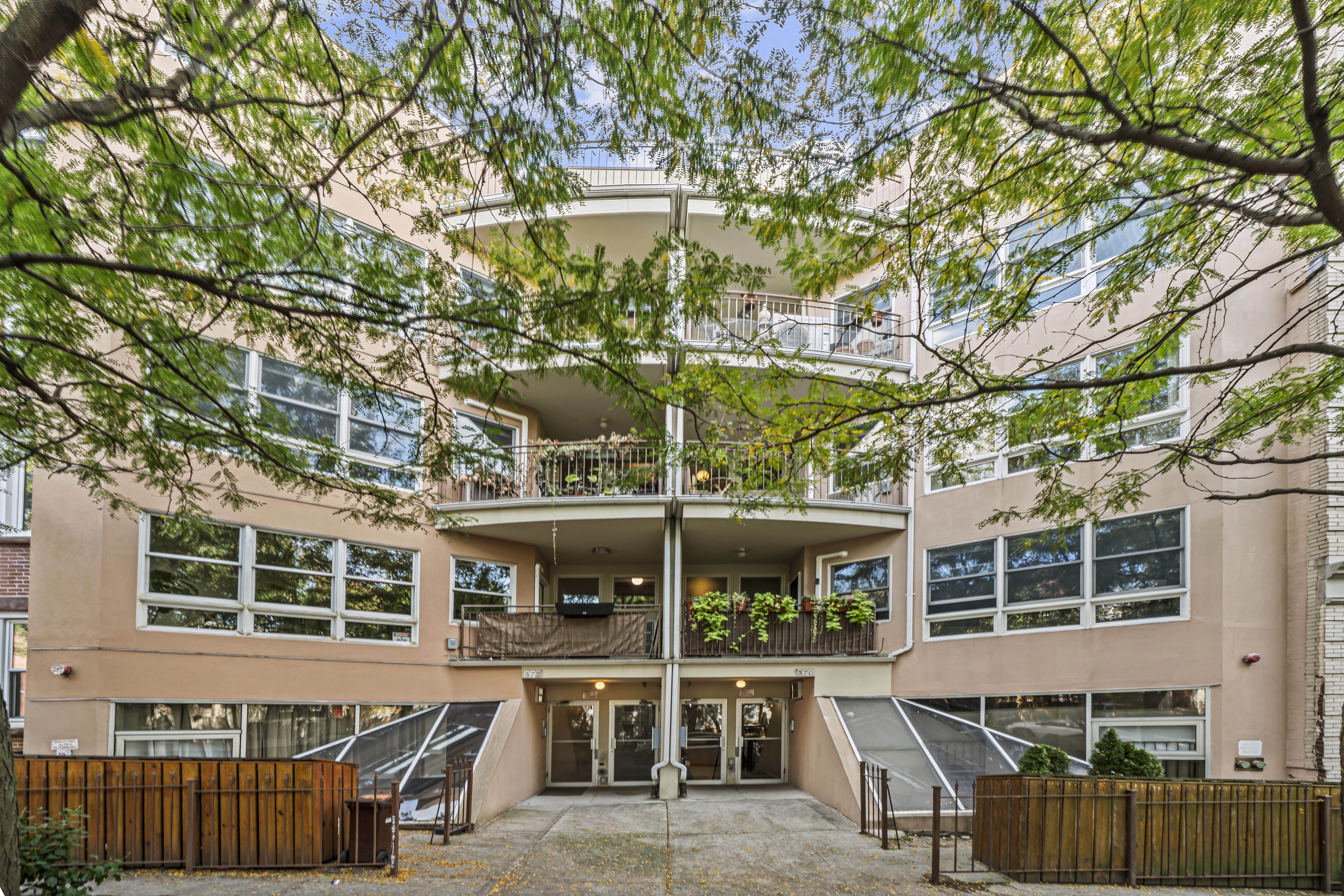 368 12th Street, Unit 5 Brooklyn, NY 11215 - Photo 10 of 11 front view of a building with a tree