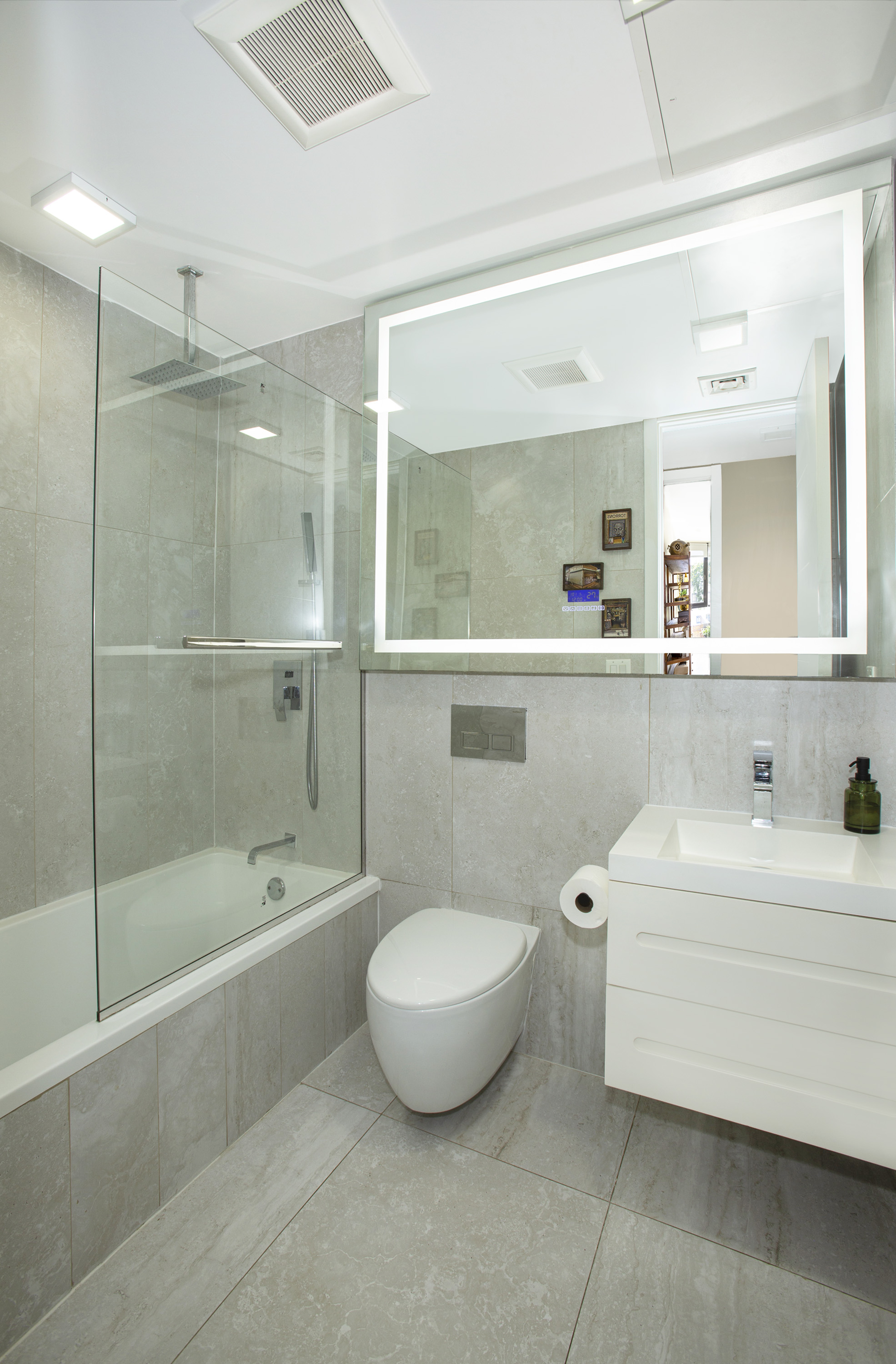 854 Putnam Avenue, Unit 2B Brooklyn, NY 11221 - Photo 8 of 12 a bathroom with a sink mirror toilet and bathtub