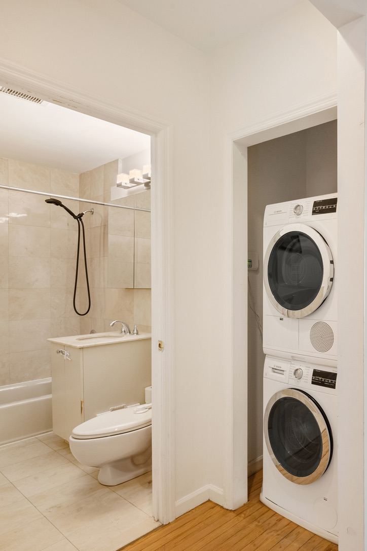 702 Ocean Parkway, Unit 5A Brooklyn, NY 11230 - Photo 6 of 9 a bathroom with a toilet and a shower