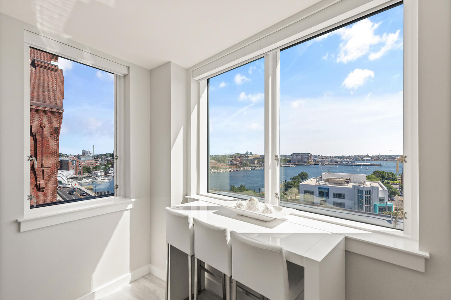 234 Causeway Street, Unit 709 Boston, MA 02114 - Photo 4 of 28 a view of a city from a dining room