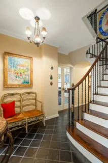 a view of a livingroom with furniture and toys