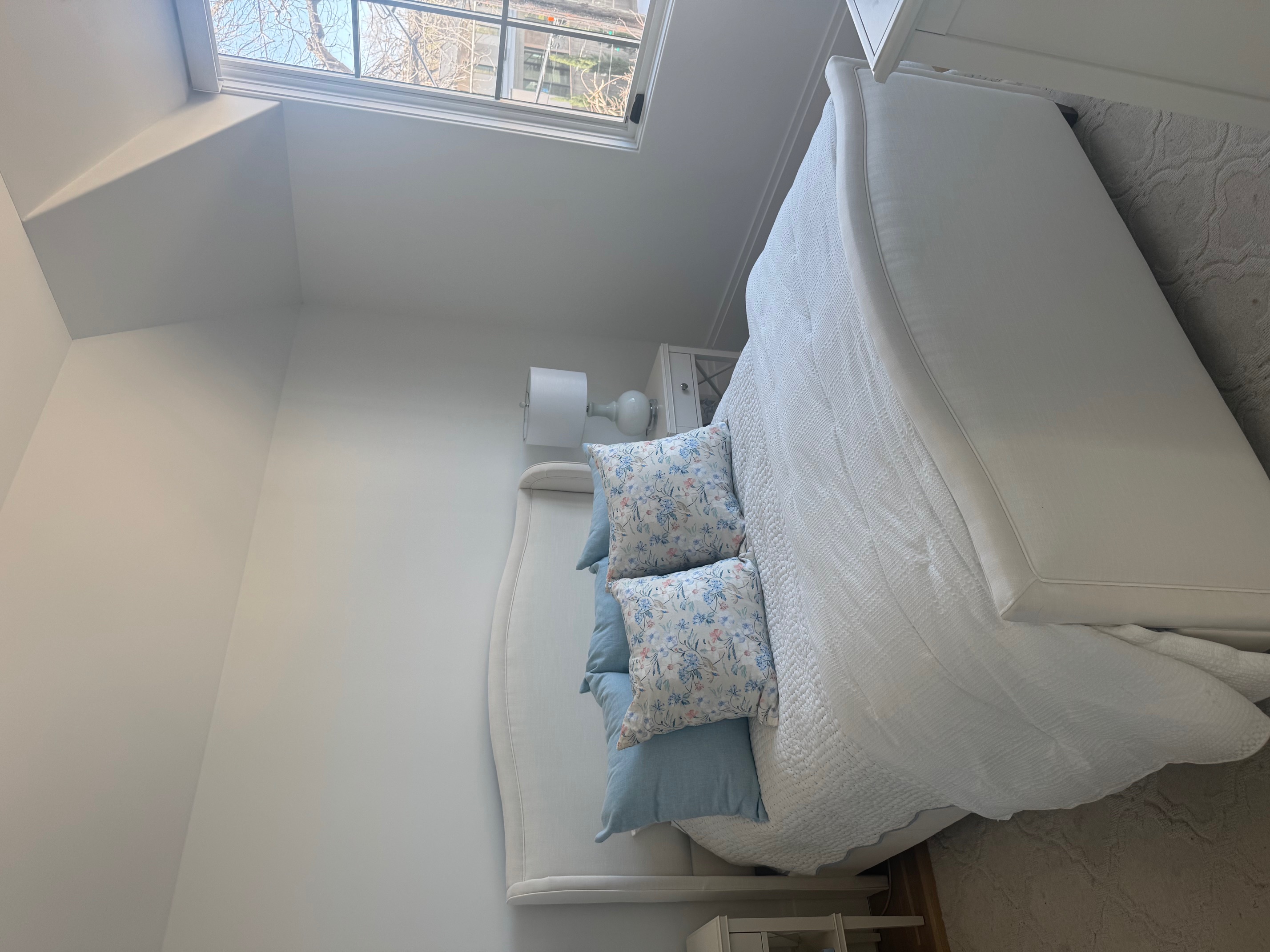 Address Upon Request Dallas, TX 75219 - Photo 4 of 12 a bedroom with a bed and window